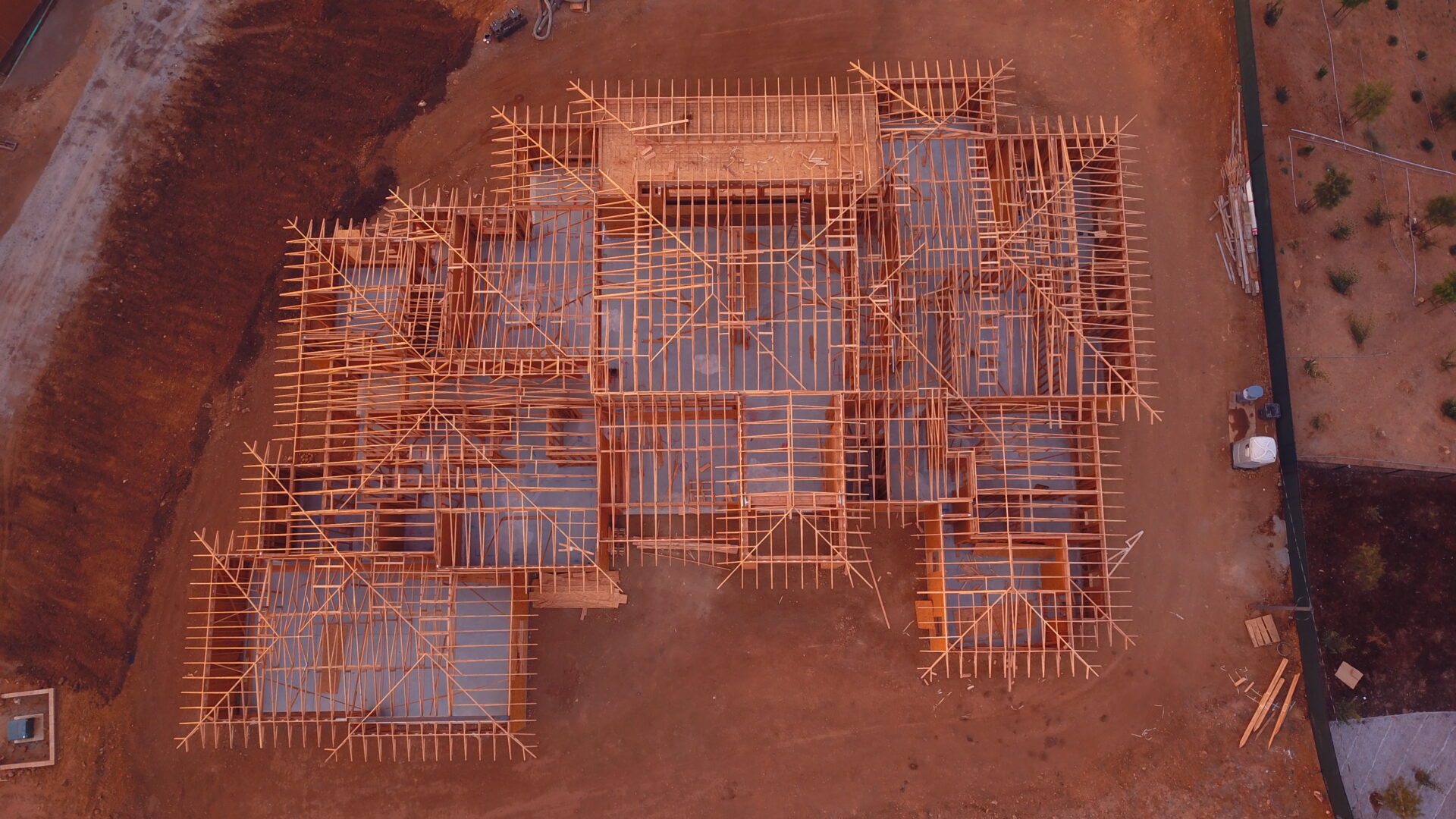 Aerial view of building construction site.