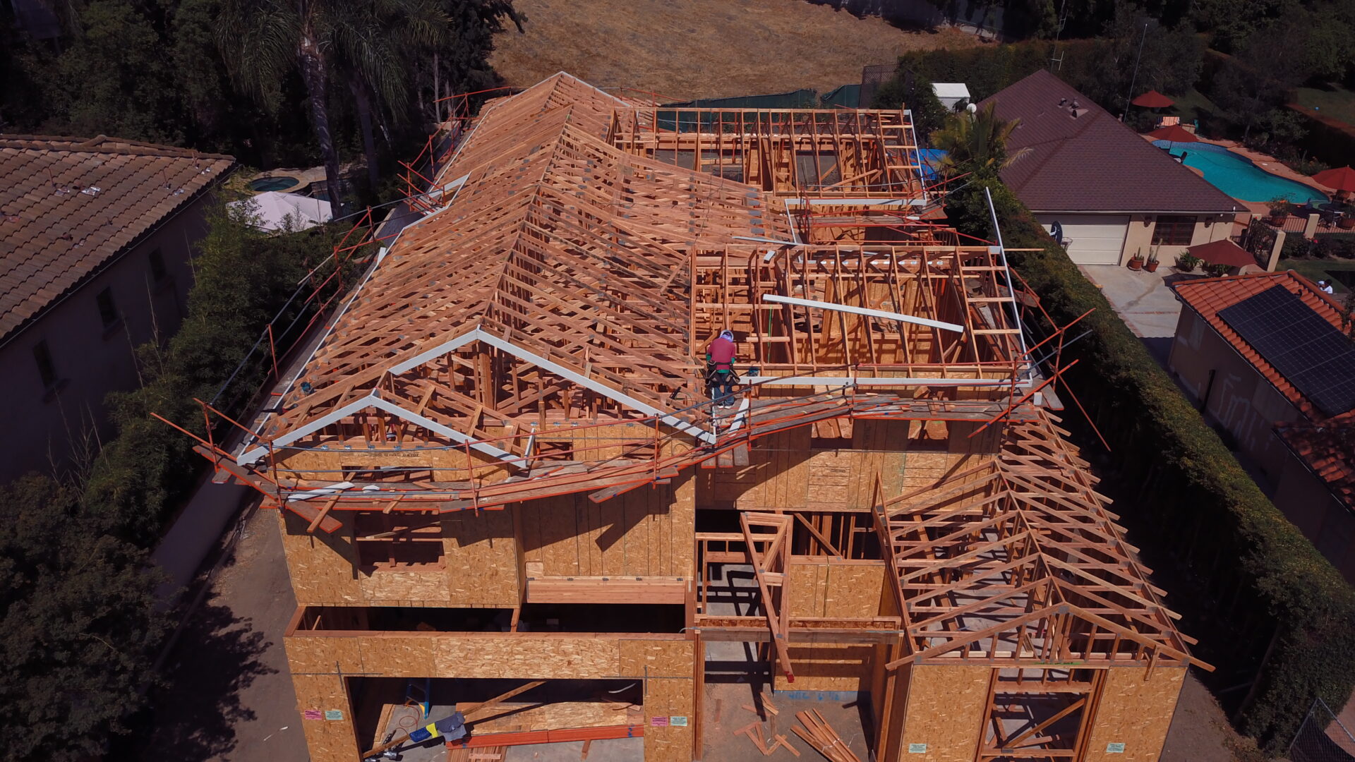 House under construction with wooden framework.